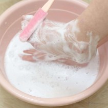 Long-handled rubber shower brush for feet