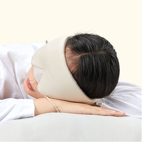 Beige blackout sleep mask