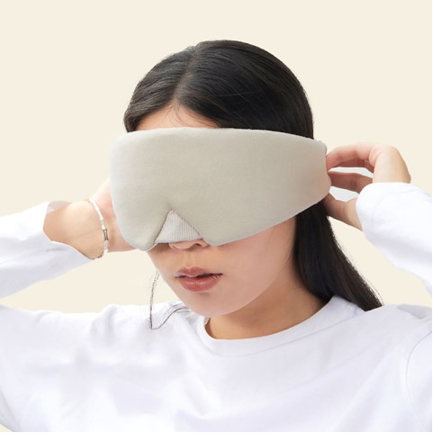 Beige blackout sleep mask